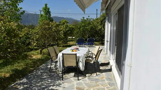 Houses in Aigialeia - photo 9